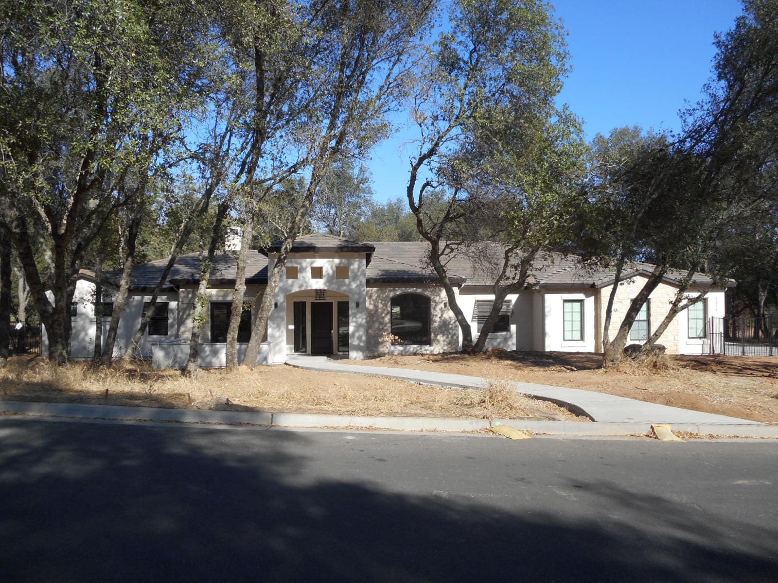 Reviewing custom home plans and budget planning in Texas Hill Country