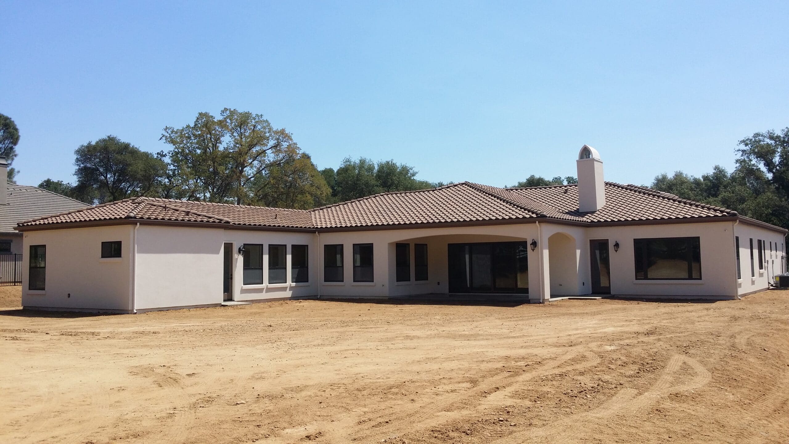 Texas Hill Country residential lot with utility poles, water meter, and open land ready for home construction